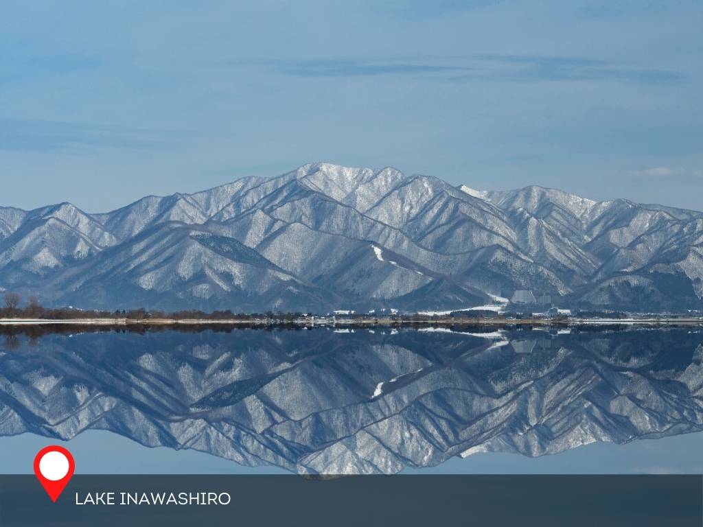 Lake Inawashiro reflecting the portion of Mount Bandai, Japan