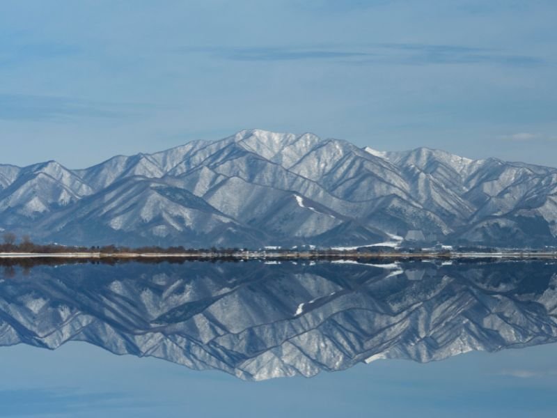 Lake Inawashiro reflecting the portion of Mount Bandai, Japan