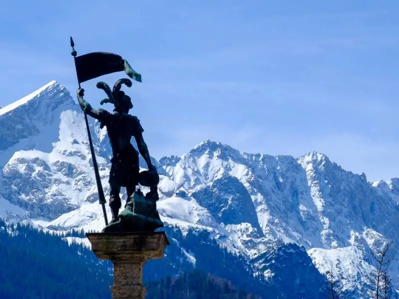 Statue and mountain view in Garmisch-Partenkirchen