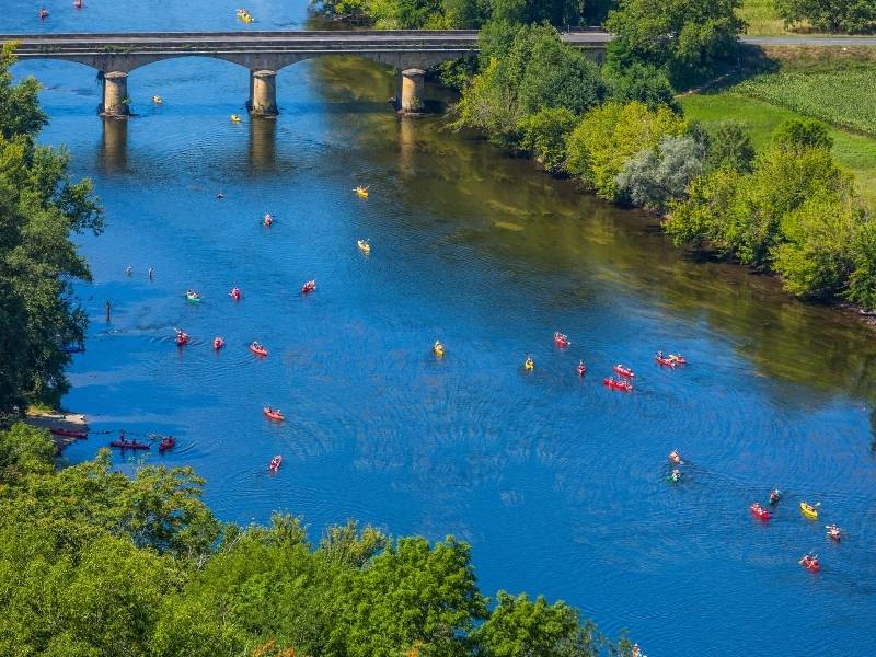 Domme France, People canoeing in the Dordogne River